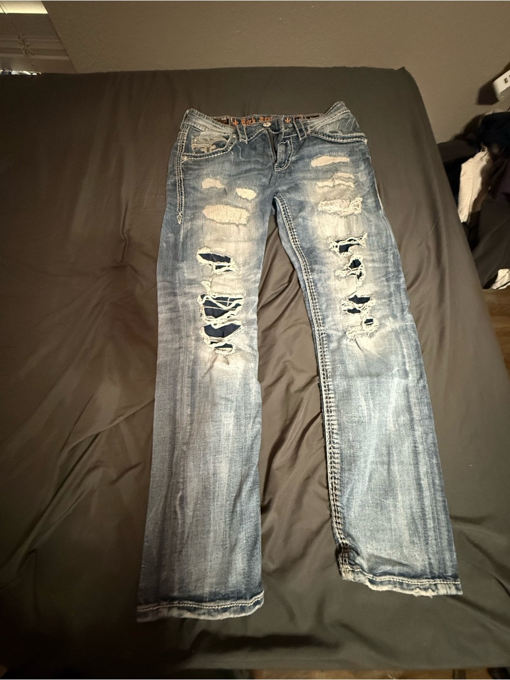 Rock Revival Men’s Distressed Light Blue Flare Jeans